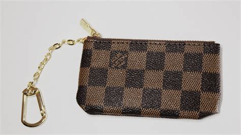 lv coin pouch dupe|louis vuitton zipper pouch.